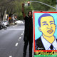 Black Lives Matter protester holds an illustration of Stephon Clark during a march and demonstration through the streets of Sacramento, Calif., on April 4, 2018.